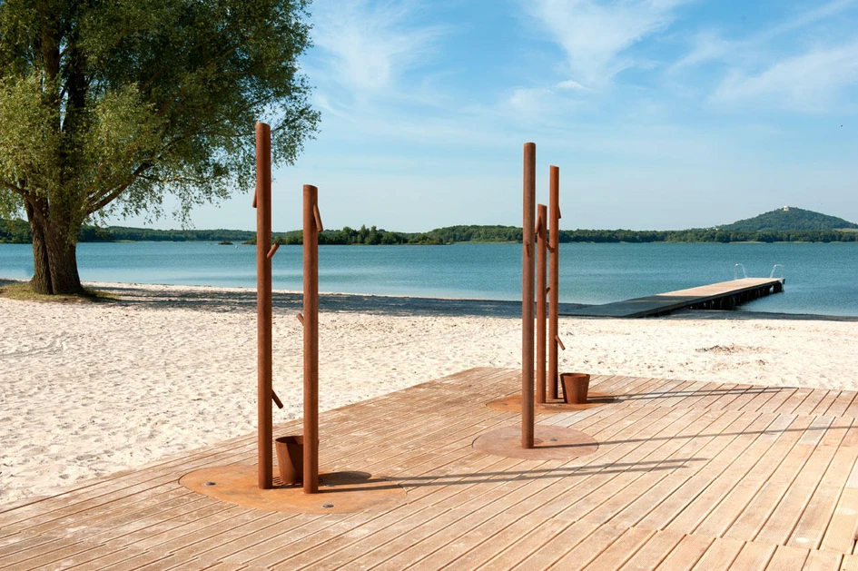 Cyria’s Monsieur collection of outdoor water sources includes small taps (top) for playing children and standing showers (bottom) to clean feet, hands and bodies before heading inside