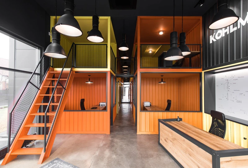 Muangthongthani Carcare’s containers with glass doors (top) and metal sunshades (middle) and Kohmlan’s redesign (bottom). Photos: Chaovarith Poonphol Photography (top, middle), Patryk Lewiński (bottom)
