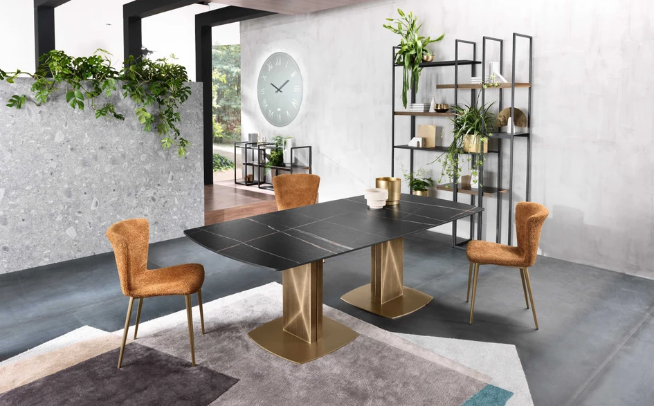 For larger table tops, a second cubic pedestal can be added for further stability, the second one positioned perpendicular to the first