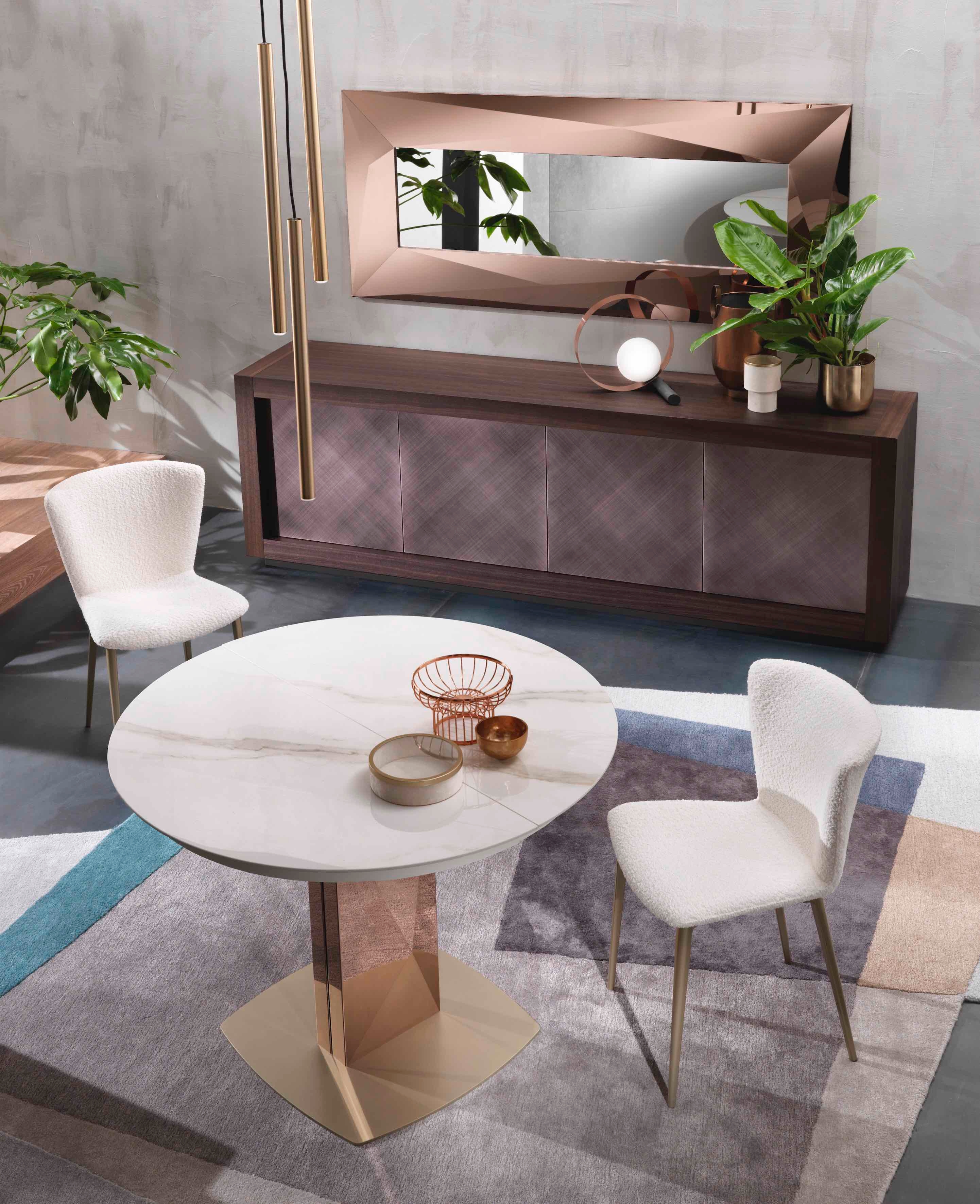 With a circular top, Sabino makes a statement hall table. By contrasting the materials of the base, pedestal and top it has a totemic, sculptural presence