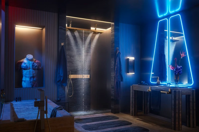 Auer sees the boundaries between living space and bathroom as fluid. That's why he brings materials like travertine, elements of art, as well as elegant lighting into play