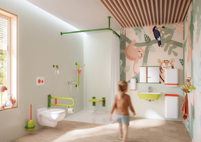 With blue (above) and green colour worlds (below), HEWI offers vibrant, child-friendly highlights for an often sterile and uninviting environment