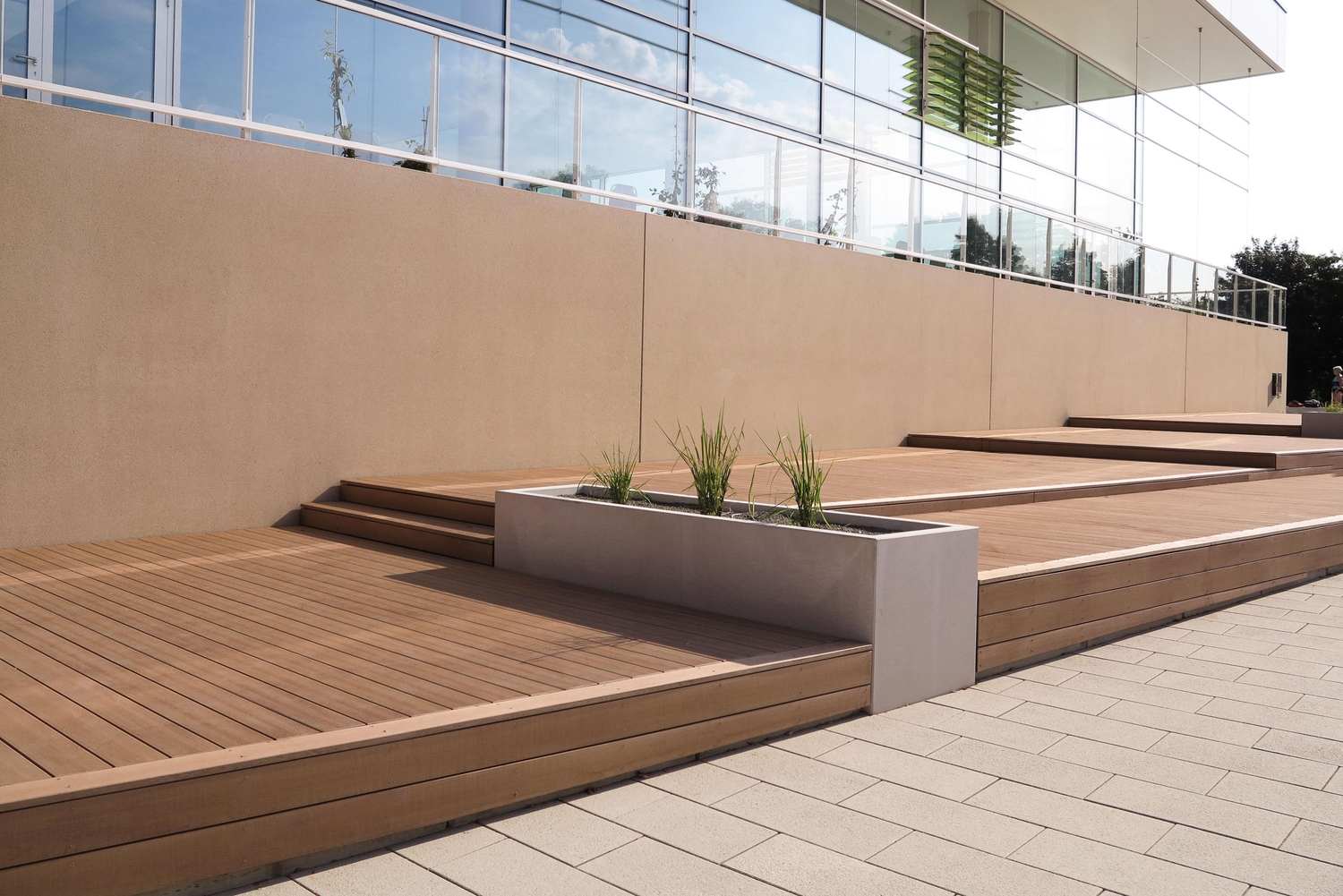 Both Metten’s Celtic granite outdoor tile (top) and Mydeck’s siena boards, made from sawdust (middle, bottom), offer superior traction, keeping slippery winter surfaces safe