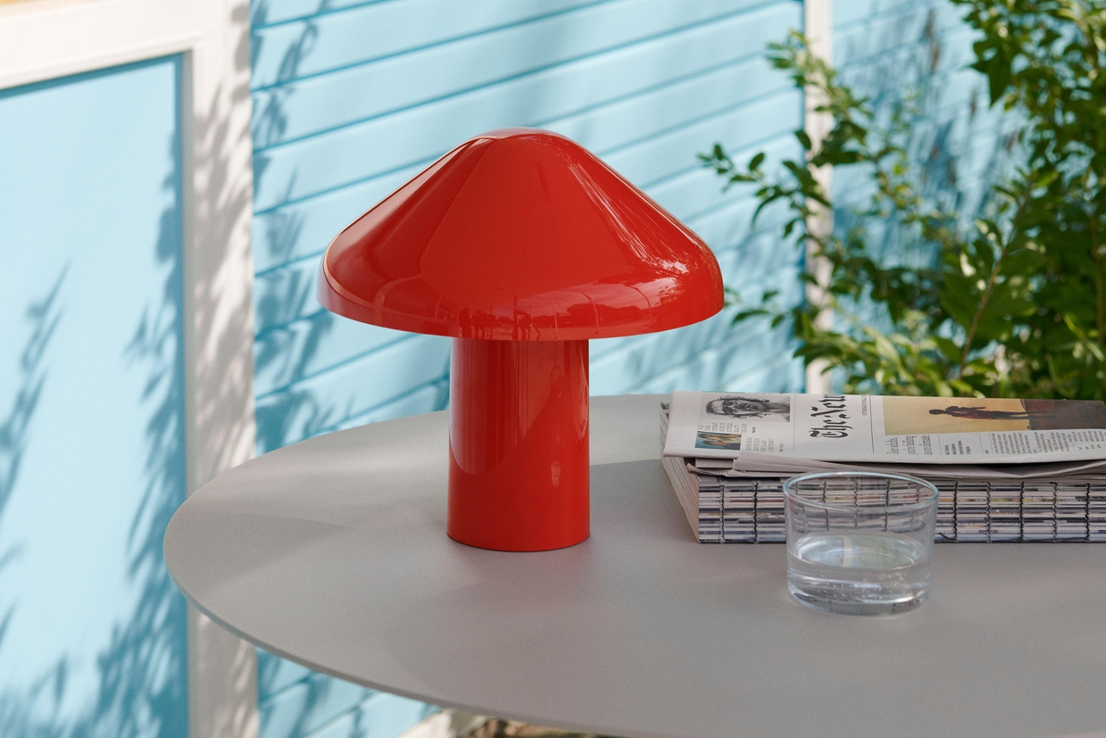 Cordless all-weather lighting like Pedrali’s Giravolta 1799 family (top) and Hay’s mushroom-shaped Pao Portable lights (bottom) come straight from Fairyland – keeping exteriors usable in the dark