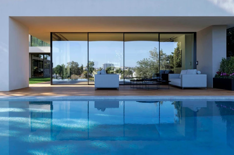Twelve Concept's exterior flooring creates a sophisticated and durable outdoor space made to withstand Athen's climate