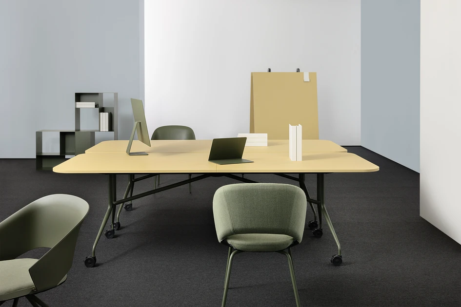 The Follow tables (above) create a flexible working environment, allowing for both standing and sitting, while the Libro folding tables (below) save space and offer adaptability, aligning perfectly with Mara’s new collections