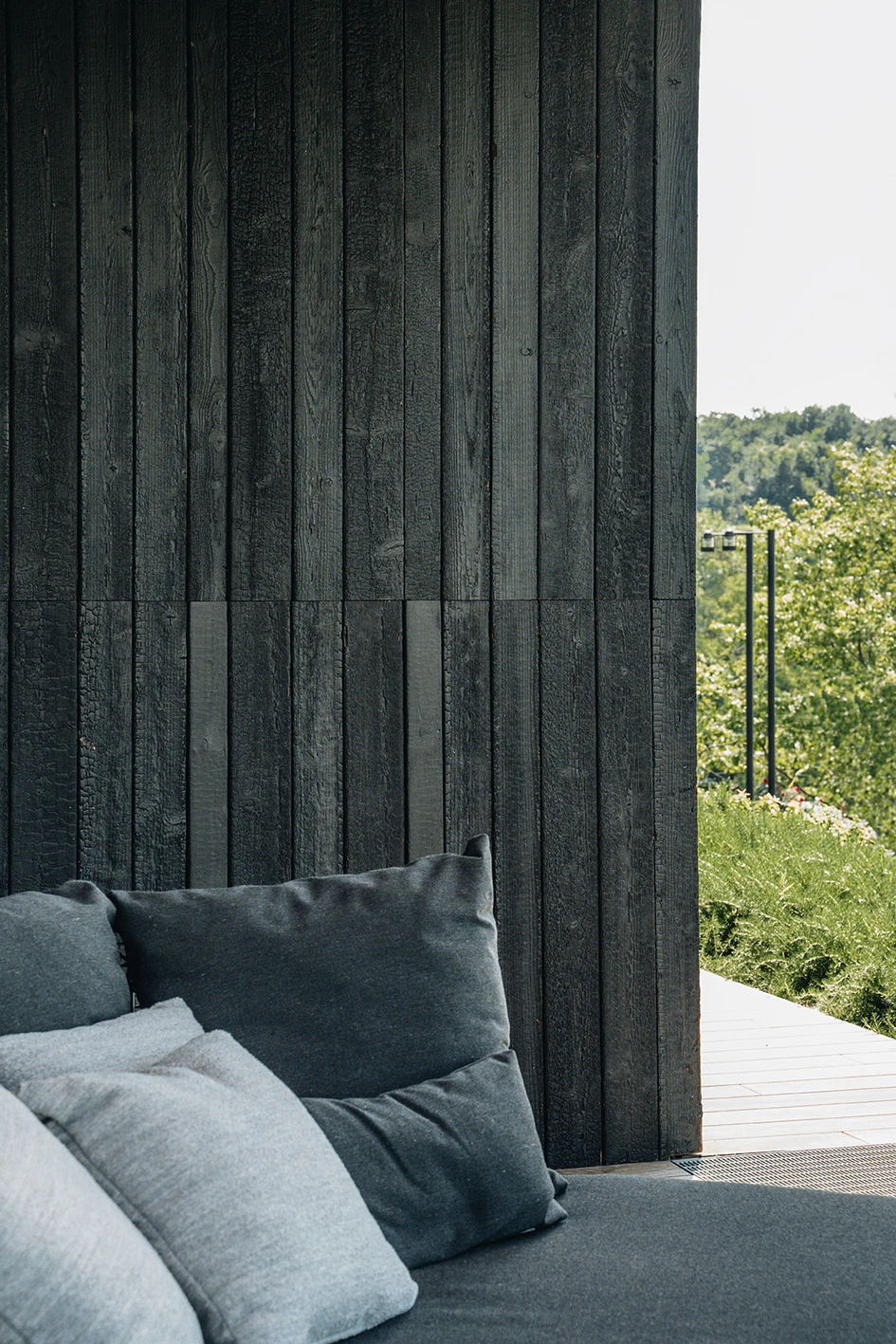 This natural, sustainable cladding enables Volcanalia to blend seamlessly with its volcanic surroundings, enhancing its connection to the landscape