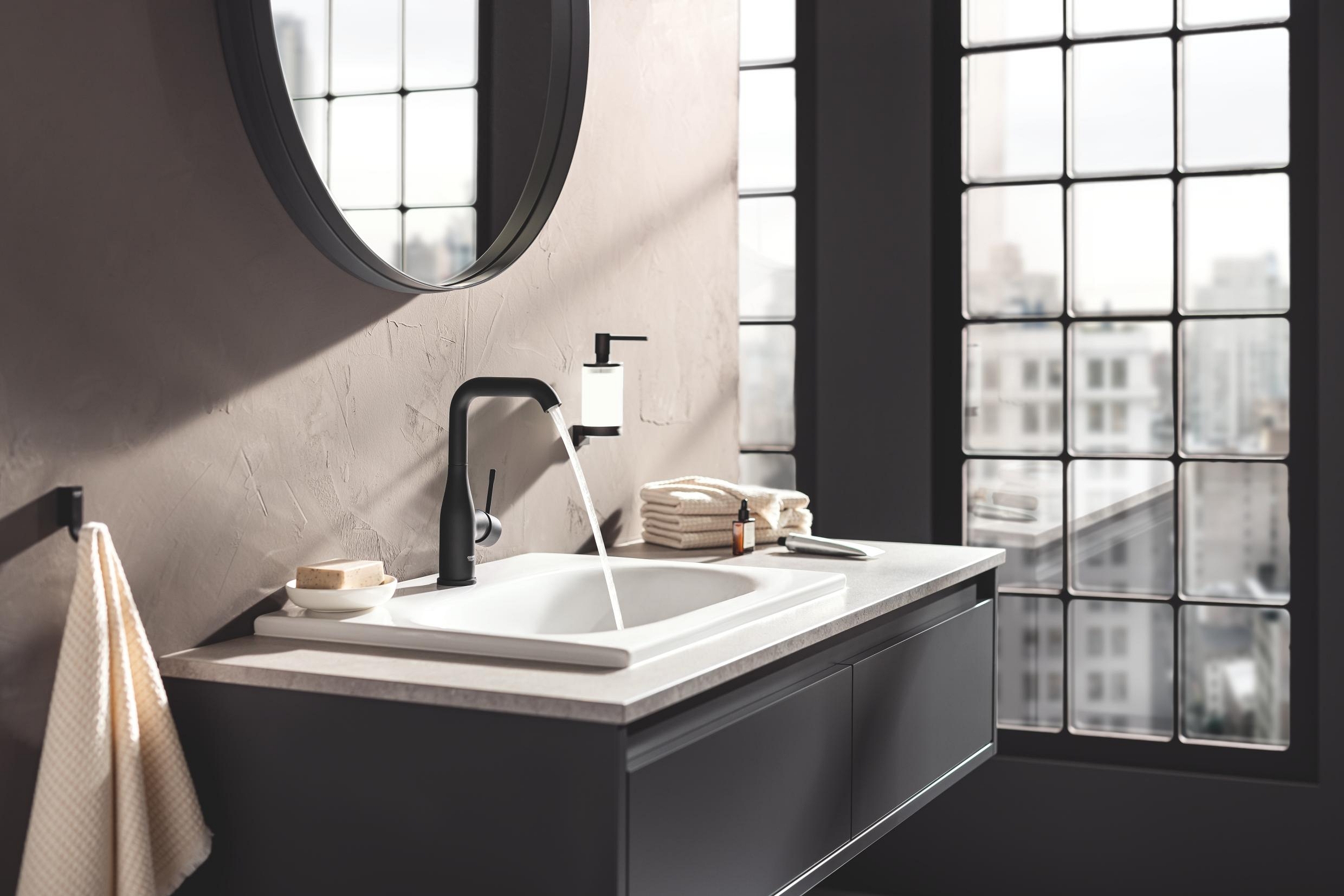 The Essence collection captures attention with its striking single-lever mixer, featuring a broad base that gracefully narrows towards the outlet for a refined yet bold look