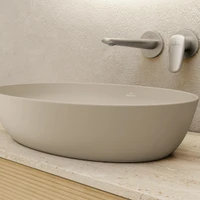 Almond impresses with its warm, matt surface that pairs harmoniously with natural materials such as wood and stone