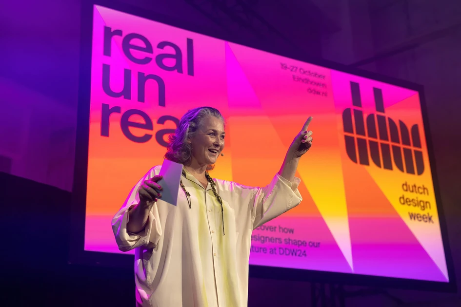 Visitors finding their way around and Miriam van der Lubbe at DDW 24's official opening. Photos: © Max Kneefel & Lotte Dale