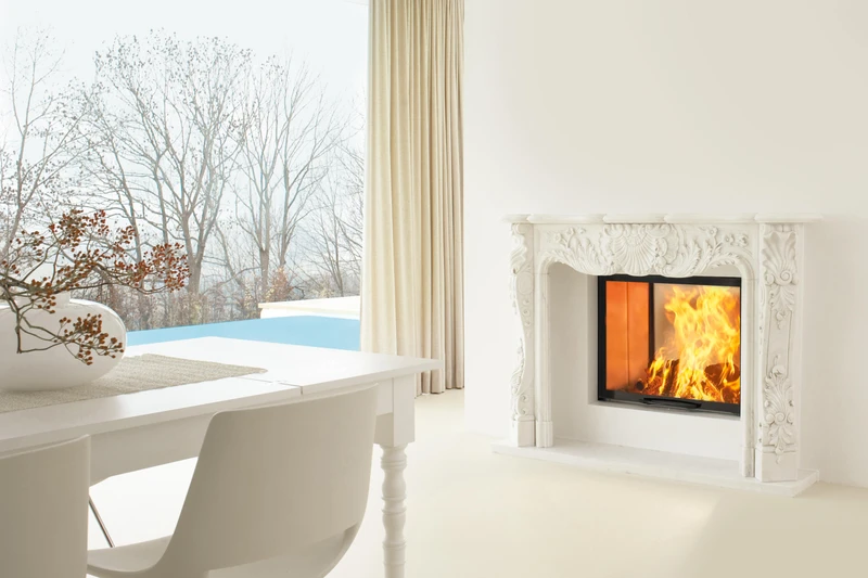 Closed-door fires like Astroline from Dovre (top) filter out wood-burning pollutants, and flat-faced fires like this from Austroflamm (bottom) can be fitted inside statement mantelpieces