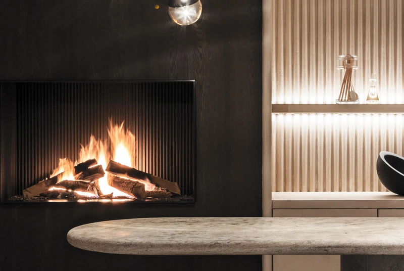 Natural gas fires like Urban from Metalfire use ceramic logs to fake the look of a real wood-burning fire, but release less pollution