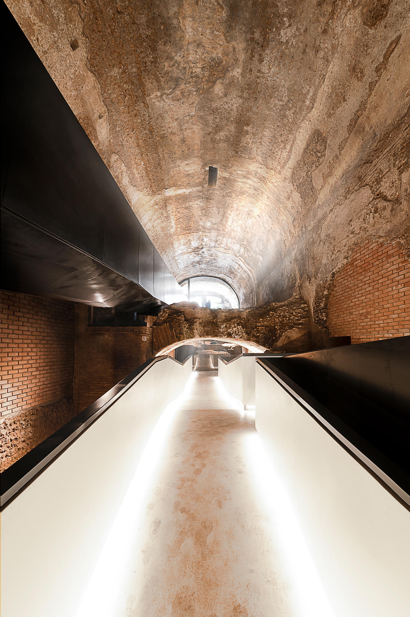 Stefano Boeri Architetti’s New Entrance to the Domus Aurea illuminates a path through the ruins using LED strips to accentuate the linearity of the intervention. Photos: Lorenzo Masotto