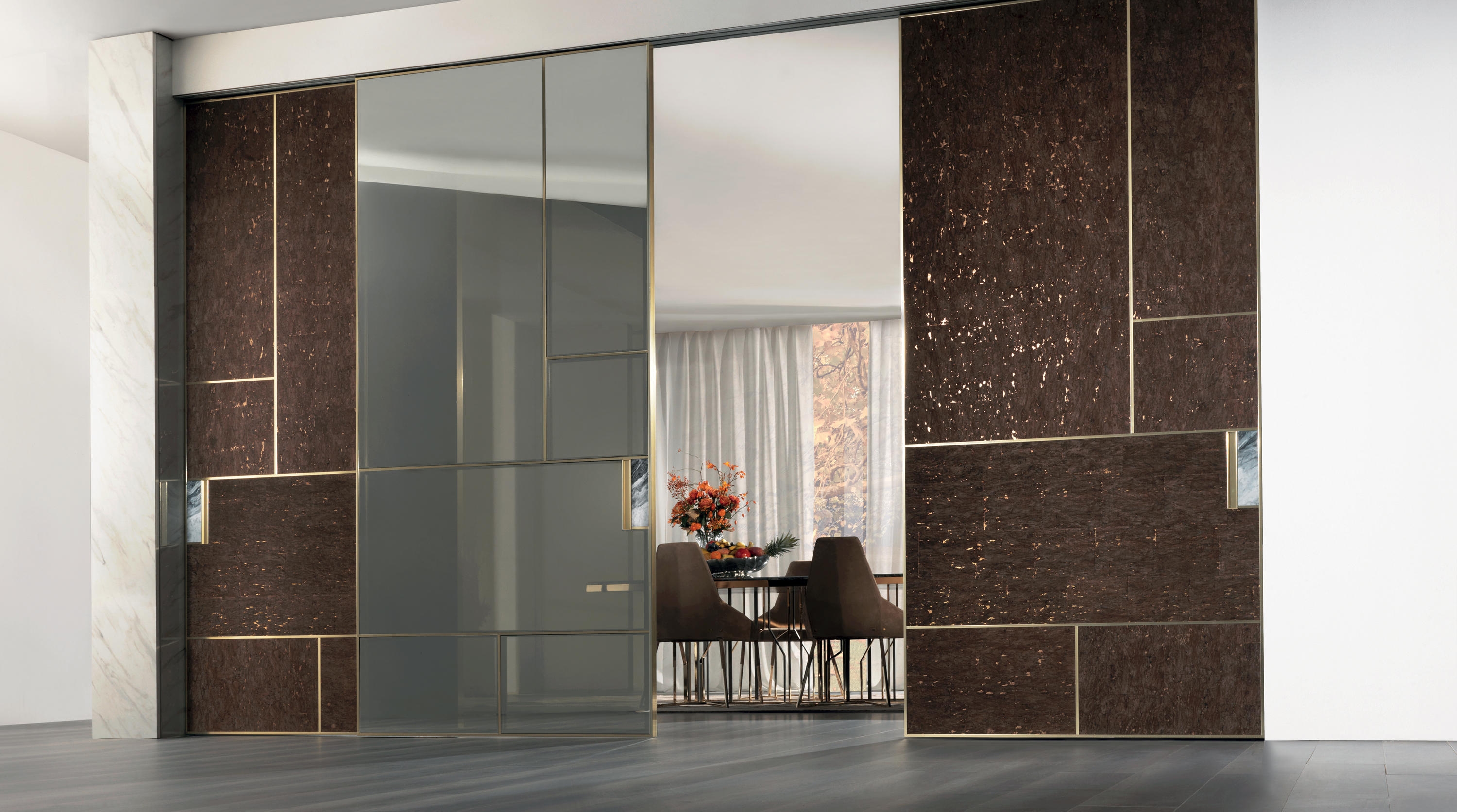 Both the Klein A45 cabins (top, middle) and Longhi S.p.a’s Land sliding doors (bottom) boast the use of cork as a highly visible surface material. Photos: Matthew Carbone (top)