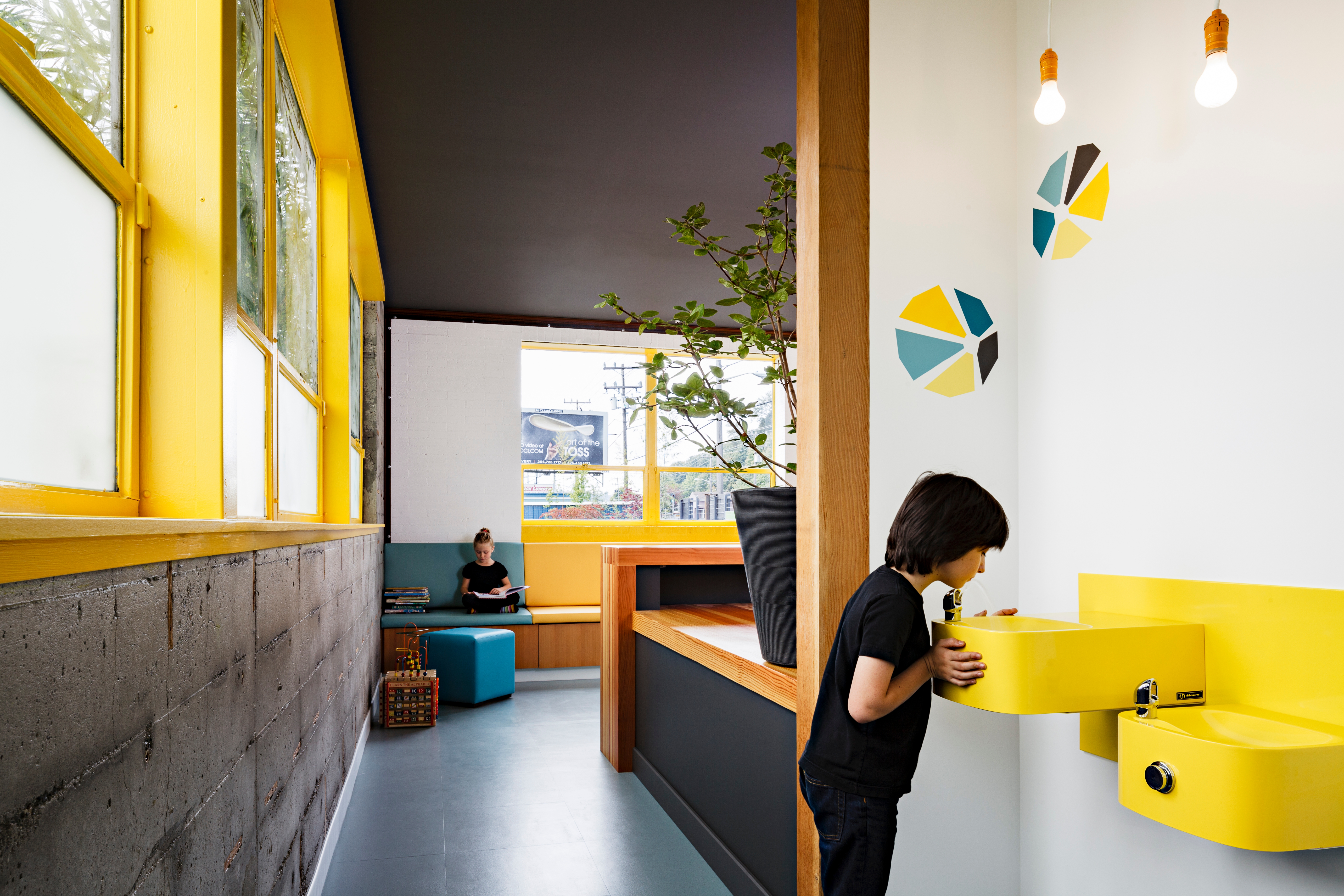 The soft floor in Adelaide Terrace (top) is easier to walk on, while Seattle Dentistry mixes the material with recycled rubber (bottom). Photos: Robert Frith (top), Lincoln Barbour (bottom)