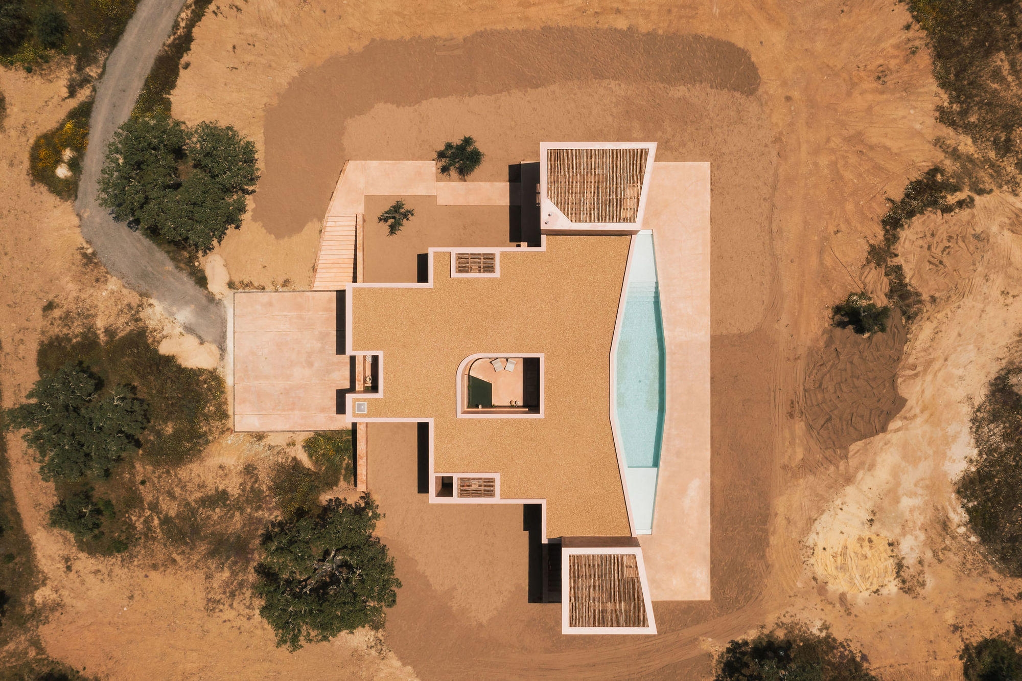 Villa CP in Girona, Spain (top), and House in Grândola, Portugal (middle, bottom) hide cork insulation between exteriors and interiors. Photos: Jesus Granada (top), Francis Nogueira (middle, bottom)