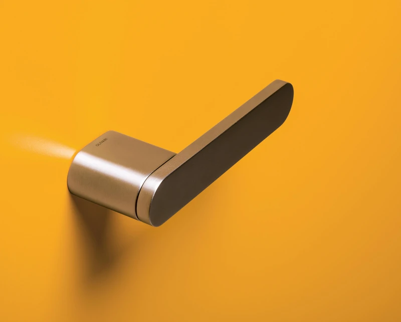 The minimalist straight-line form of the Radial lever handle from Olivari uses no baseplate and is available in satin bronze (pictured), copper, anthracite, steel or chrome