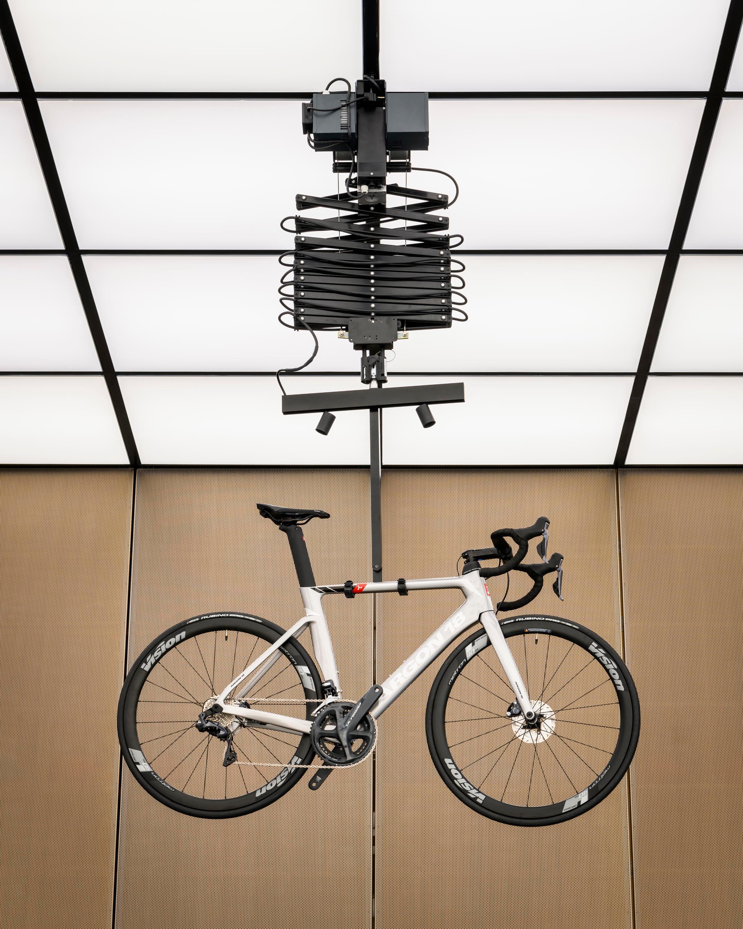 Commercial Biplano bicycle storage units from Metalco, (top) and ceiling-hung bicycle storage at the United Cycling Lab & Store (middle, bottom). Photos: Alastair Philip Wiper (middle, bottom)