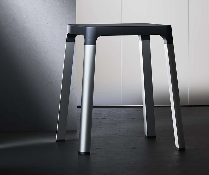 Completing the range, the accompanying stool is insensitive to water and able to bear loads up to 150 kg. Placed next to the washbasin or under the shower, the seat is available in black or white with a matching frame