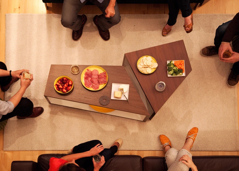 Coffee tables on castors like Linddna's Curve Table L (top) or Coalesse's Sebastopol design (bottom) provide more space to stretch your legs after a lazy dinner or have your movie snacks on the side rather than in front of the sofa