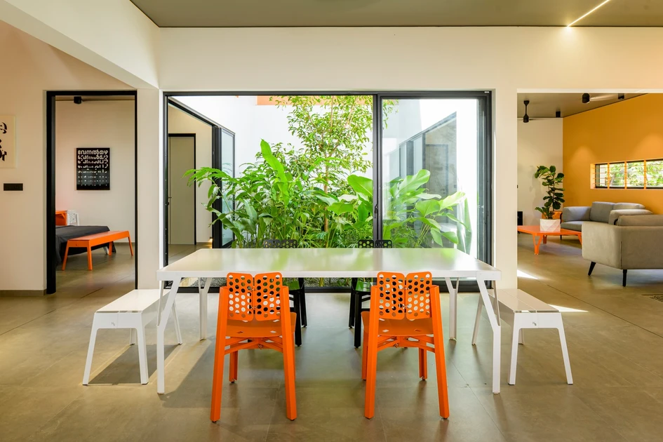 Vegetation distinguishes the look and feel of the courtyards at The Colour Burst House: one invites exploration and relaxation with a bench (top) while the thicker brushes (bottom) bring calm. Photos: Praveen Mohandas
