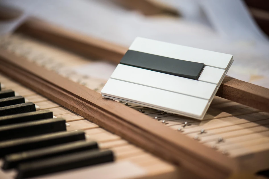 Van den Weghe’s recessed Lapris multi-push contact switch (top), Forbes & Lomax’s screwless transparent switchplate (middle) and Lithoss’ instrument-inspired black and white Piano switch (bottom)