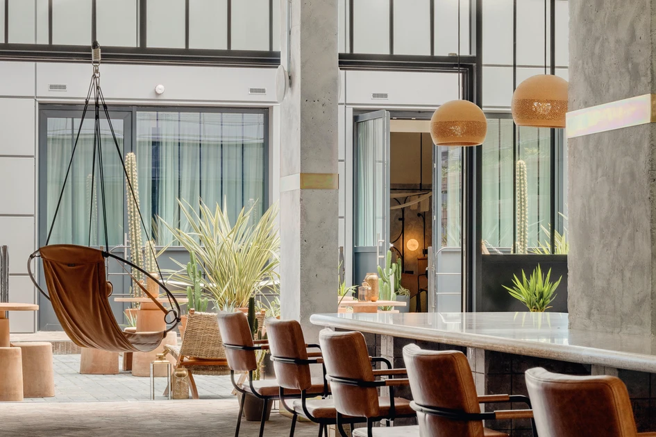 The Bermonds Locke Hotel has been designed with serious ranch-style undertones, with clay bricks and cacti complementing the hospitality space’s leather-upholstered furniture. Photos: Edmund Dabney