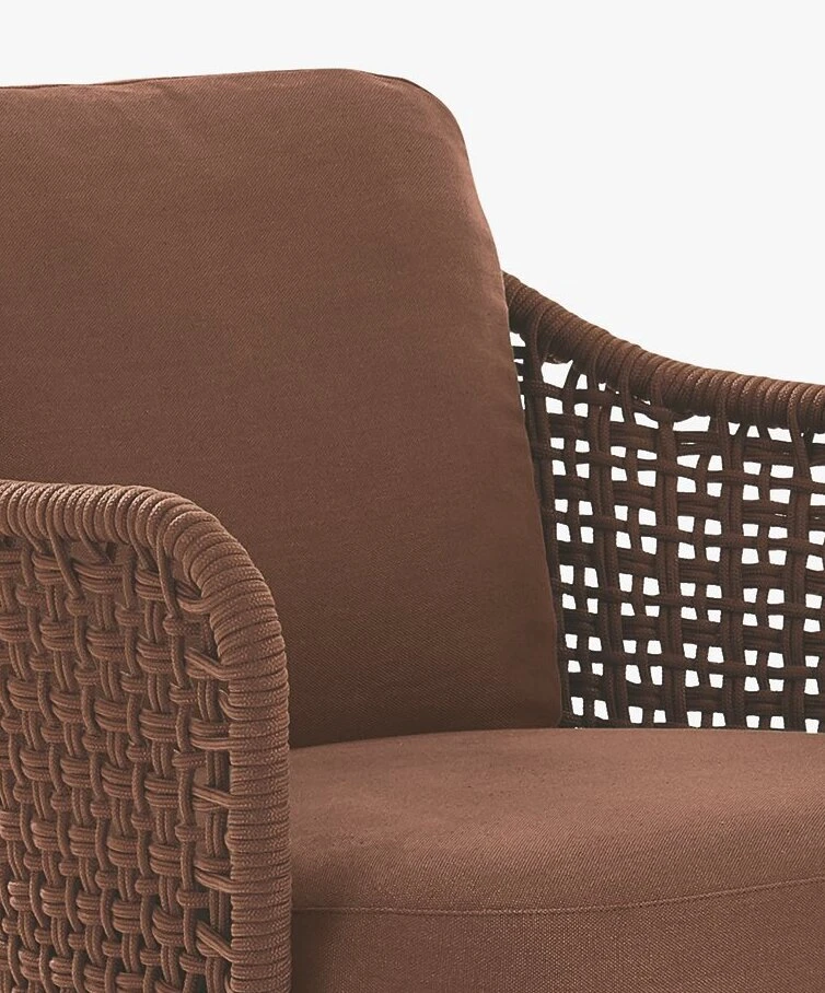 The Mad Out armchair features woven sections, which lightens the structure for a new life outdoors