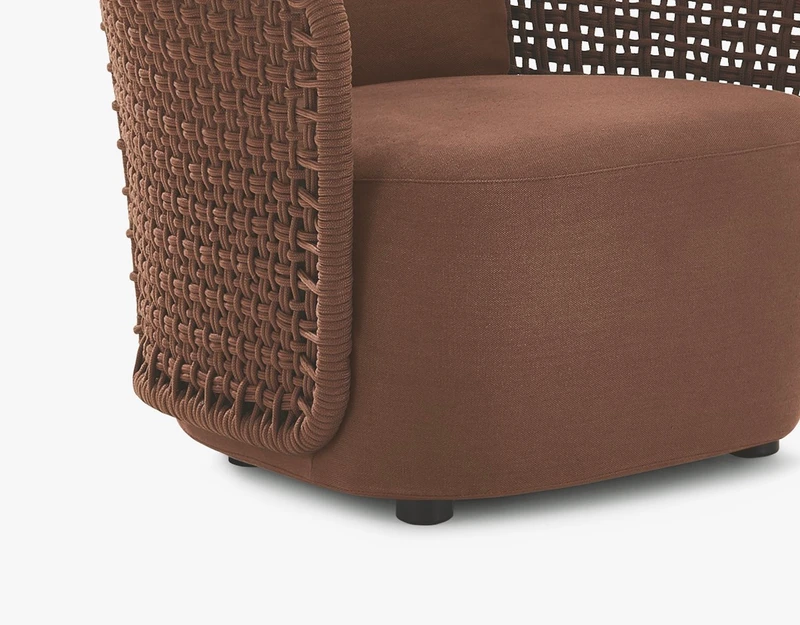The armchair and sofa are available in cream, brick or brown, to match with the coffee table made from lava stone with glazed pattern