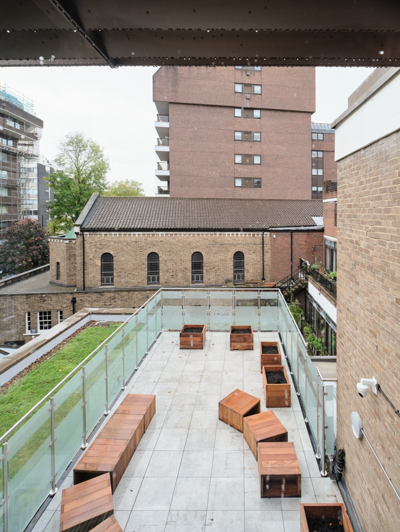 St. Christina’s Primary School multiplies both outdoor space and interior natural light with two extra well-glazed storeys with outdoor learning terraces and sedum roofs. Photos: Simon Kennedy