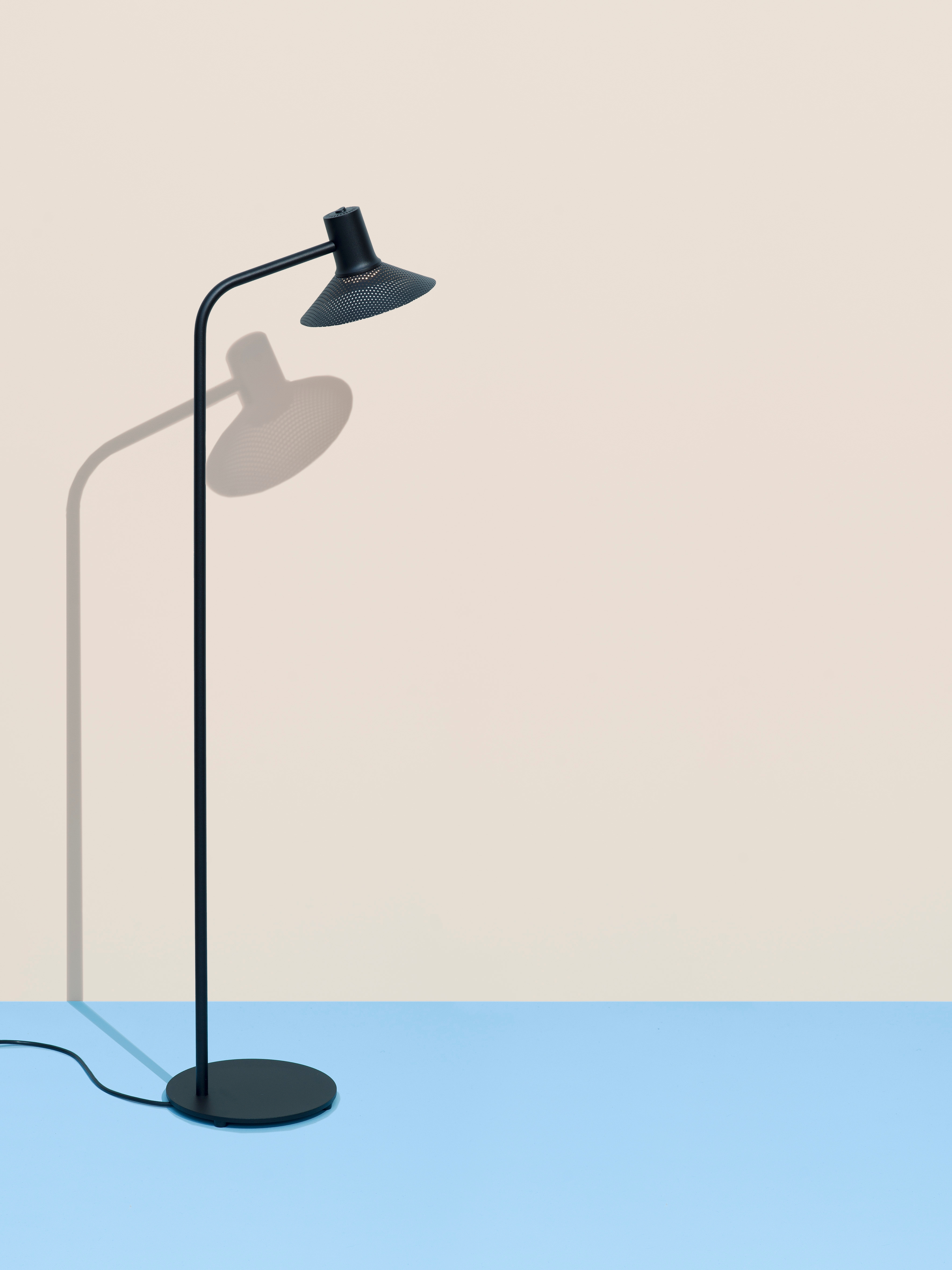 Compose is a playful, multi-coloured modular range, equally at home as a wall light or as a floor lamp