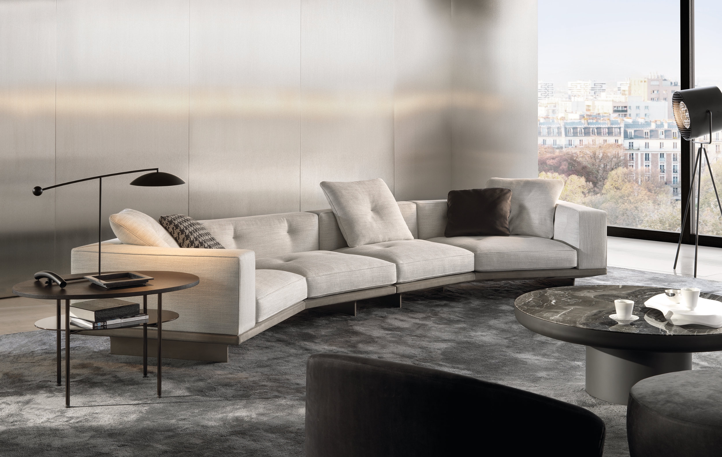 The airy and modern Dylan modular seating system by Rodolfo Dordoni for Minotti is contemporary with couturier details
