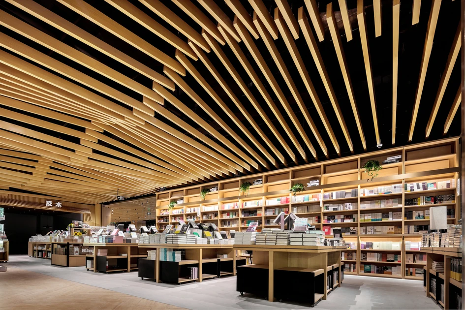 Wooden baffles create a softened soundscape in the Kids Science Labs (top) and an undulating wheat field in the Yanjiyou Bookstore (middle, bottom). Photos: Mike Schwartz (top), Dick.L (middle bottom)