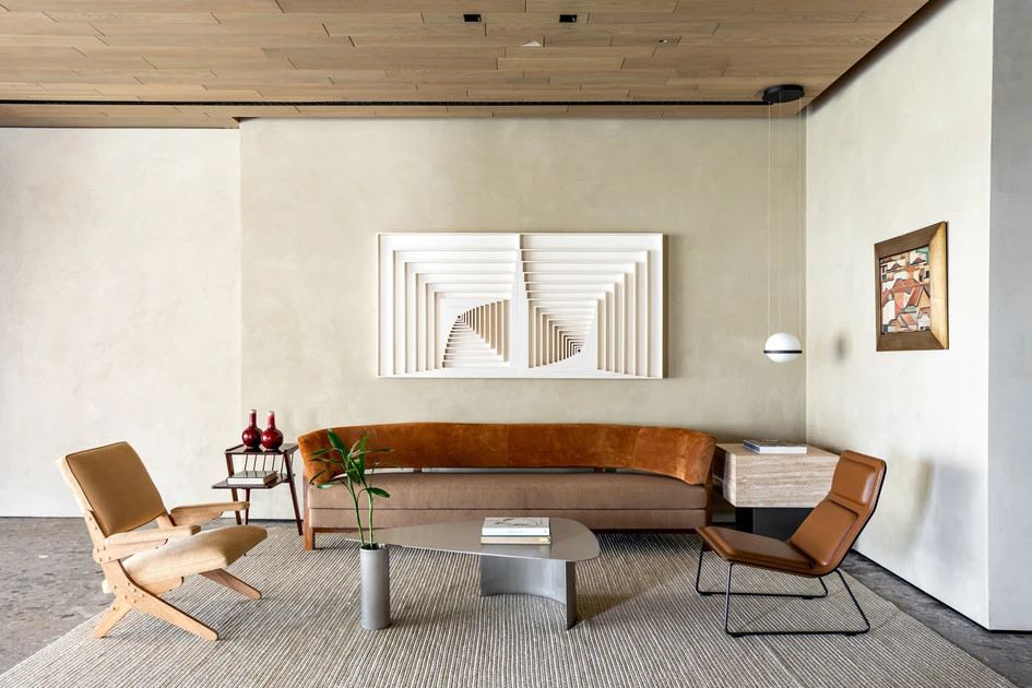 Meireles+Pavan Arquitetura's Ceppo Apartment in Brazil puts emphasis on the use of exclusive and rustic materials to create a contemporary and comfortable atmosphere for owners and guests. Photo: Fran Parente