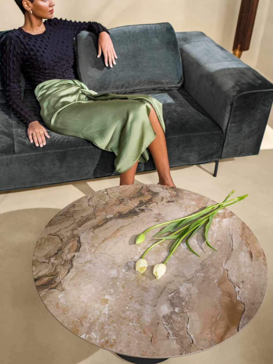Apartment DL by StudioLIM creates intrigue and a contemporary flair with mixed materials (top, middle) and pieces such as BoConcept's Madrid coffee table (bottom). Photos: André Mortatti (top, middle)