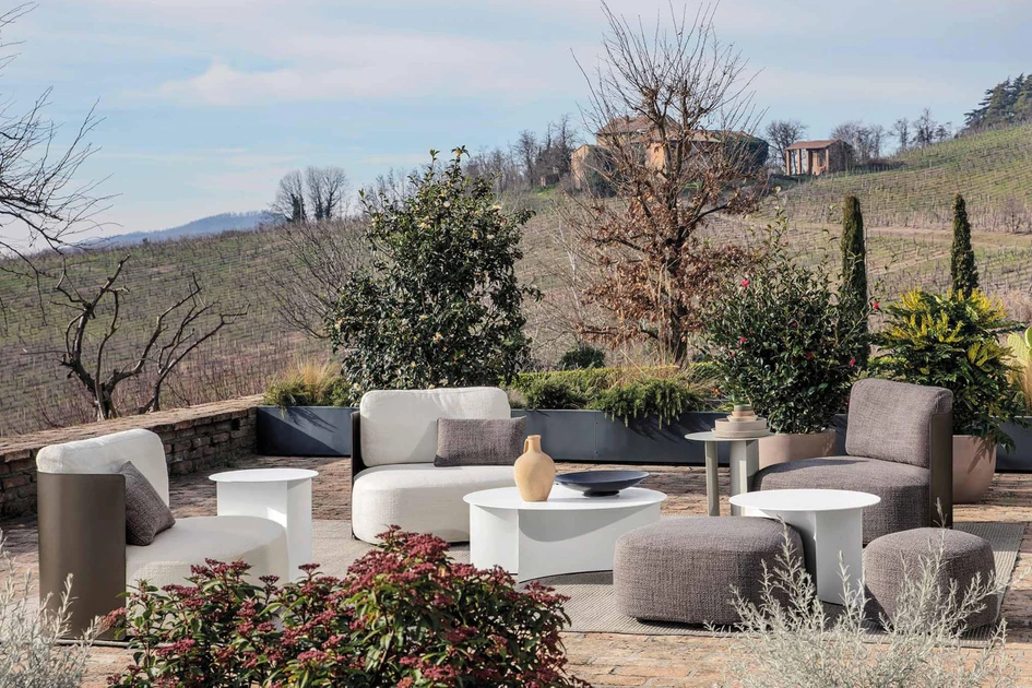 A ventilated filling allows Tribù’s Natal Alu sofa (top, middle) to be left outside in a sudden downpour and Flou’s Pierre collection (bottom) comes wrapped in water-resistant fabrics Fabian and Miguel