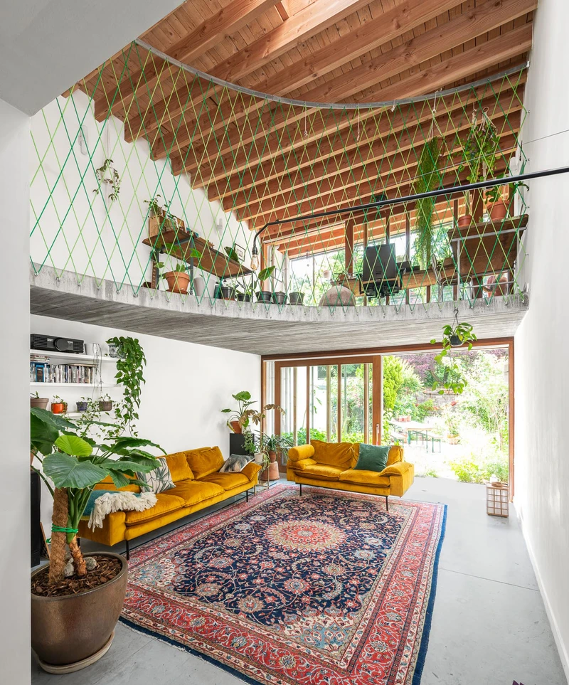 Mezzanine levels at the True Headquarters office (top) and the private Brecht & Nele House residence (bottom) improve communication. Photos: Steve Hanson (top), Mr Frank (bottom)
