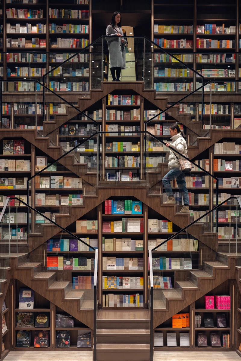 The mezzanine balconies of the Xintiandi Style II Shopping Center (top) and ‘crazy stairs’ at the Chongqing Zhongshuge Bookstore (middle, bottom). Photos: Wen Studio (top), Feng Shao (middle, bottom)