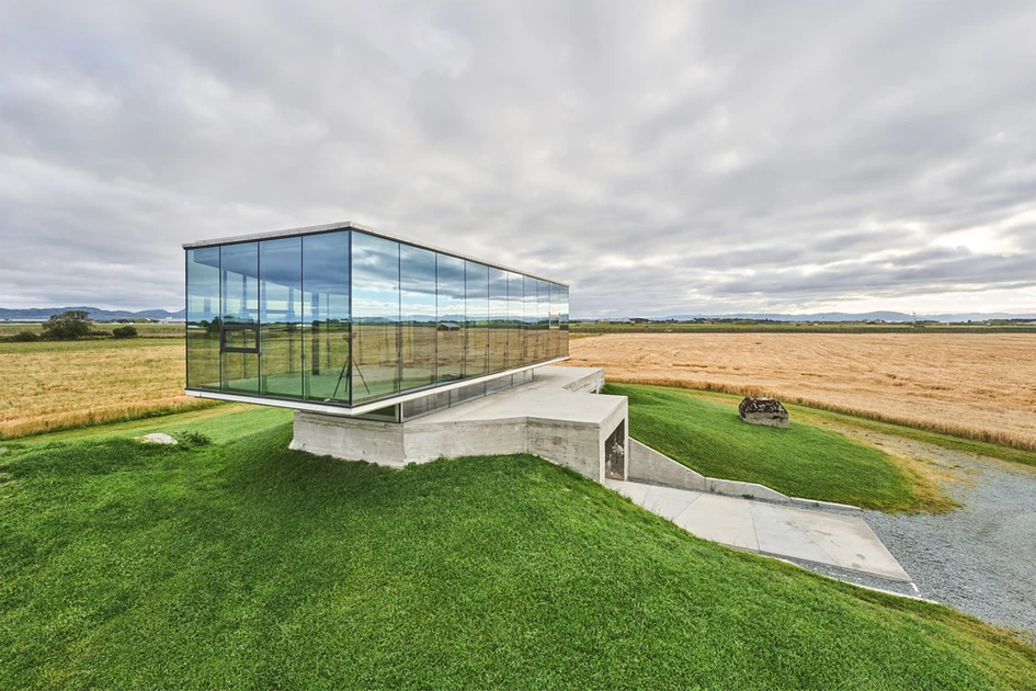 The Pavilion Breksted brings attention back to an old bunker in Norway, by positioning a glass frame above its entrance. Photo: Kristoffer Wittrup