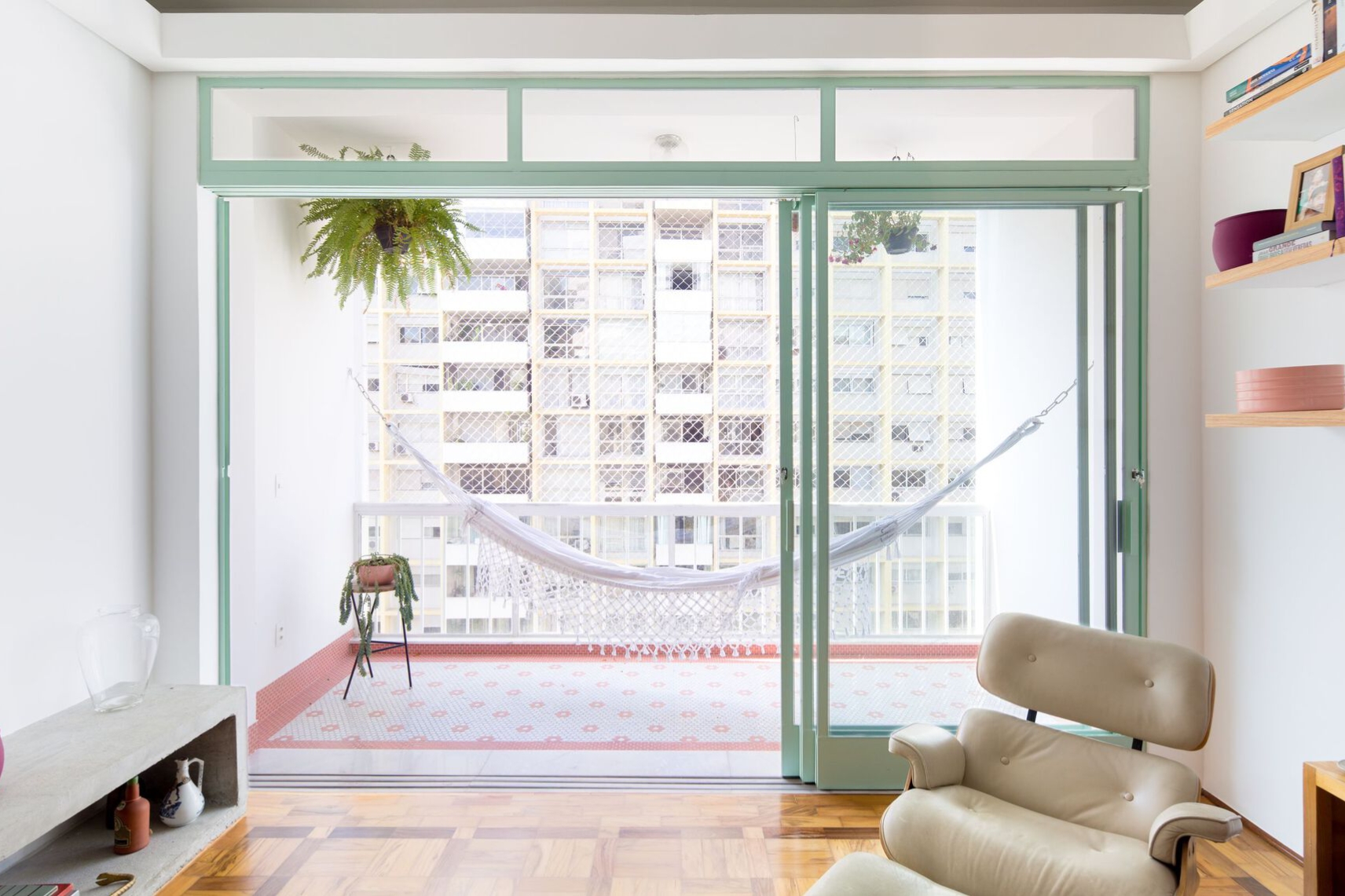 The Frame lounger (top) and Farniente hammock (middle) from Paola Lenti and the Sabará Apartment’s balcony with wall-hooked hammock (bottom). Photo: Paula Monroy (bottom)