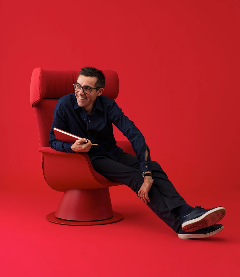 Patrick Jouin and his Ila chair, just one of numerous pieces the French designer has created for Italian furniture brand Pedrali over the last ten years. Photo: Thomas Duval