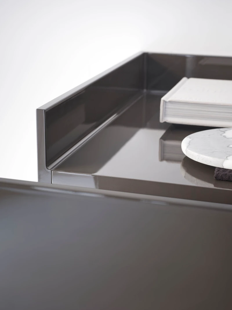 The Minimum collection by Victor Vasilev features monolithic wall-mounted washbasins and matching storage, available in a wide choice of materials (and antibacterial finish) for creative combining