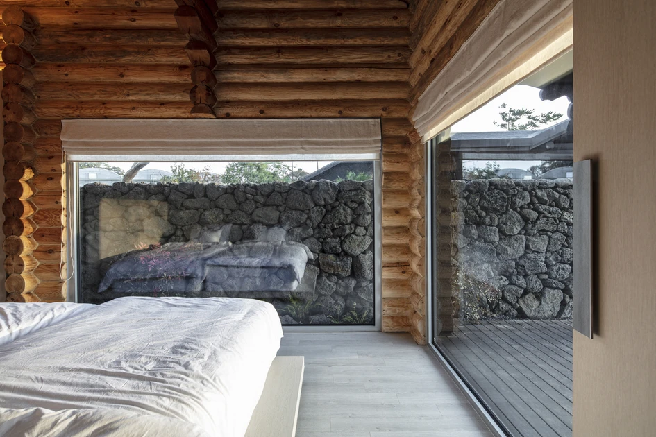 Built with local materials and local traditional techniques, the Space of Muwi Stay features wide windows and open terraces to experience the locality of the landscape. Photos: Kiwoong Hong