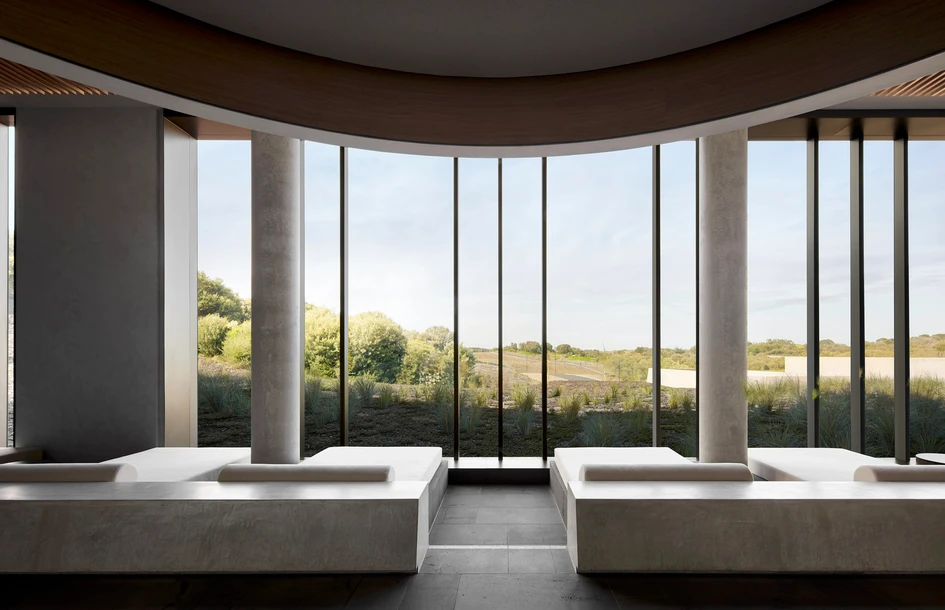 The use of raw concrete in the Alba Thermal Springs and Spa allows the original organic sensibilities of the former green wedge site to become the hero. Photo: Willem Dirk Du Toit