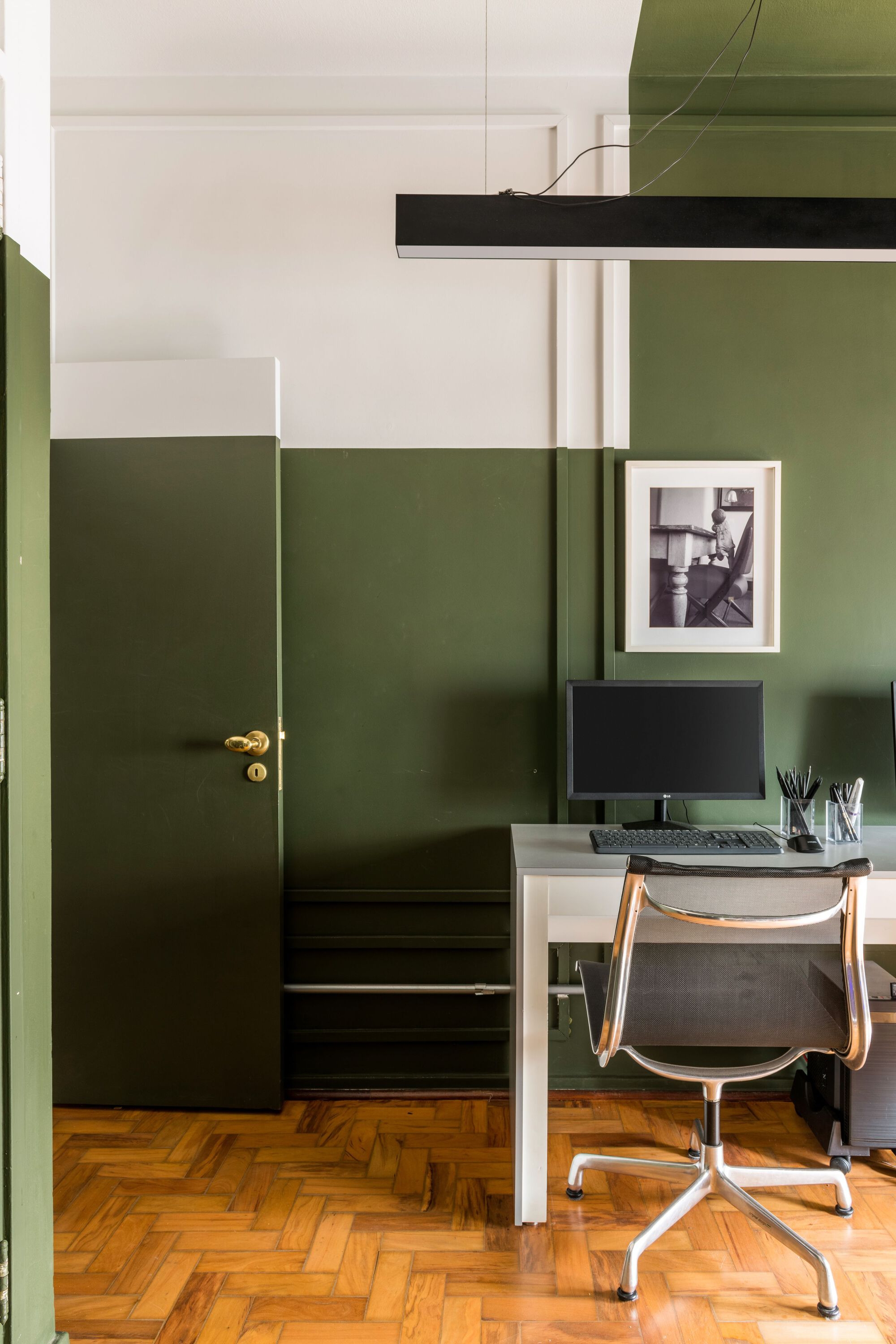 Bold cuts of contrasting paint colours graphically define the walls at the Pauliceia Apartment by Ricardo Abreu Arquitetos. Photos: Renato Navarro