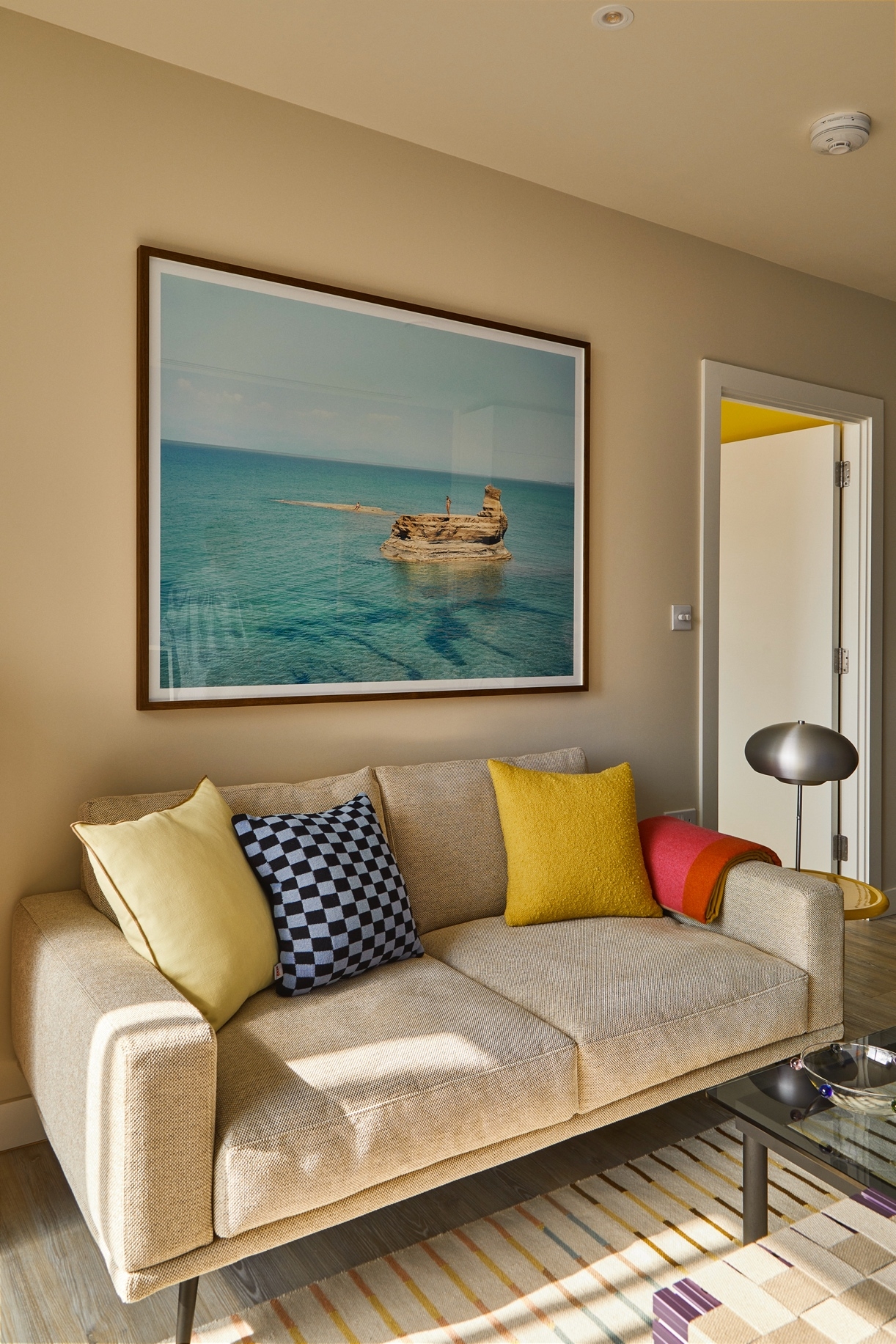 The seemingly basic two-seater Carlton sofa, here shown in a natural woollen fabric, is available in a variety of fabrics and leathers and comes in a large corner sofa format, too 