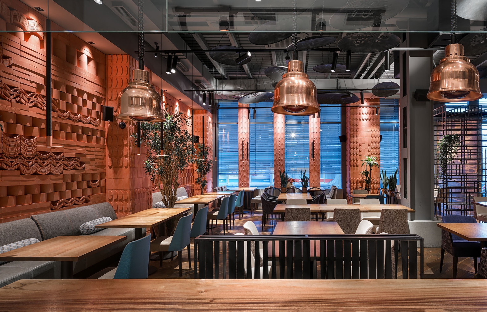 Culture is a large part of the decor and the menu at the Ugli Restaurant, with traditional cooking processes not only visible but also open for all to try their hand at. Photos: Andrey Adveenko