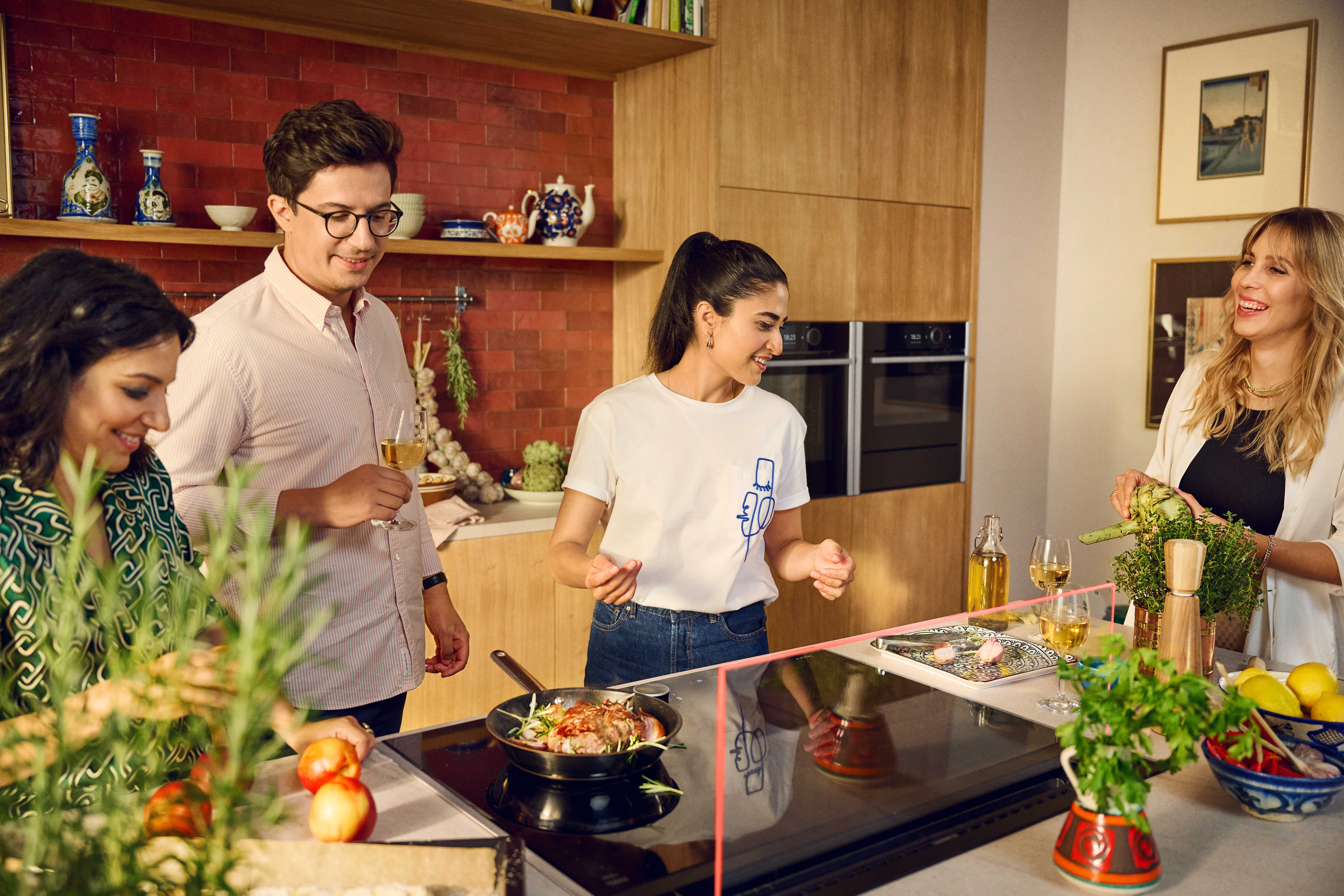 Gallerist Anahita Sadighi is having fun in her kitchen with Flex Control, which allows you to tap or swipe, or move entirely to another appliance