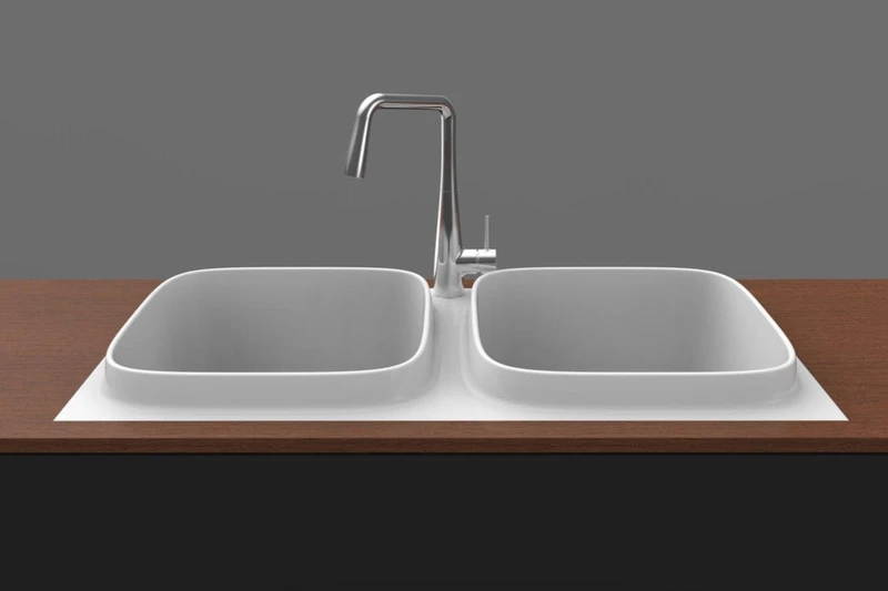 An under-mount sink like Mythos from Franke Home Solutions (top, middle) is a perfect partner for the clean look of a minimalist kitchen, but Scarabeo’s Up sink (bottom) stands to demand attention