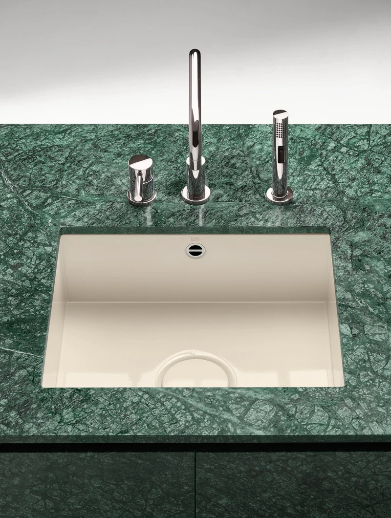 Sink CS (top) is made from solid surface HIMACS, meaning the sink and worktop can be moulded as one continuous form, while Dornbracht’s glazed steel (bottom) material is easy to care for
